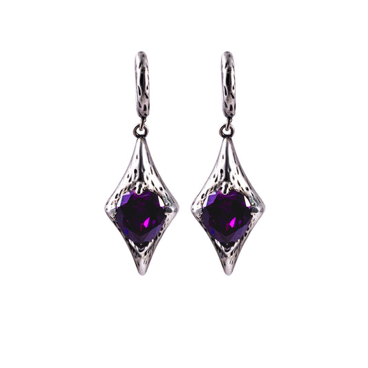 Claw-Grasped Earrings